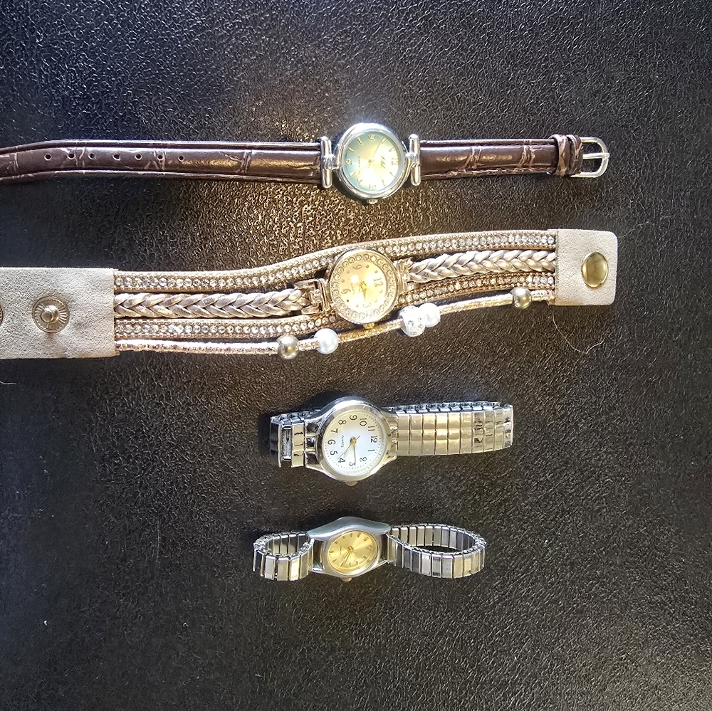 watches lot of quarts... 4 different working watches